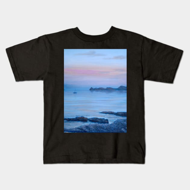 LOOKING TOWARDS PORTITXOL FROM CALA BLANCA BEACH AS THE SUN DISSAPEARS LEAVING A PURPLE BLUE SKY Kids T-Shirt by MackenzieTar